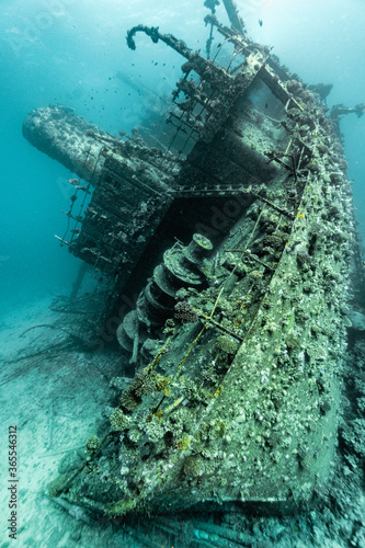 Old shipwreck laying on the bottom of the ocean 