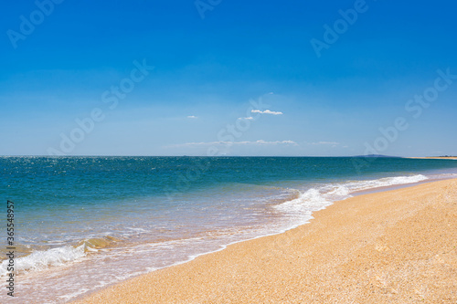 Fototapeta Naklejka Na Ścianę i Meble -  the azure turquoise sea with yellow sand from shells
