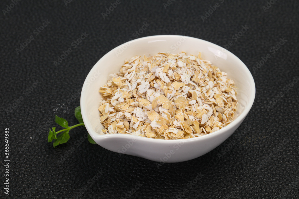 Raw oats in the bowl Raw oats in the bowl