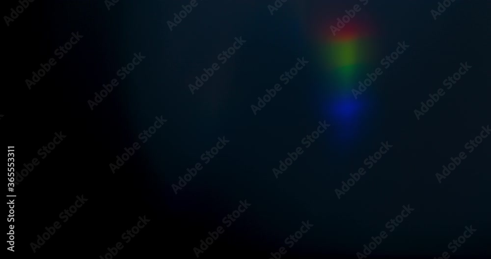 Prism Rainbow Light Flares Overlay on Black Background Prism Rainbow Light Flares Overlay on Black Background