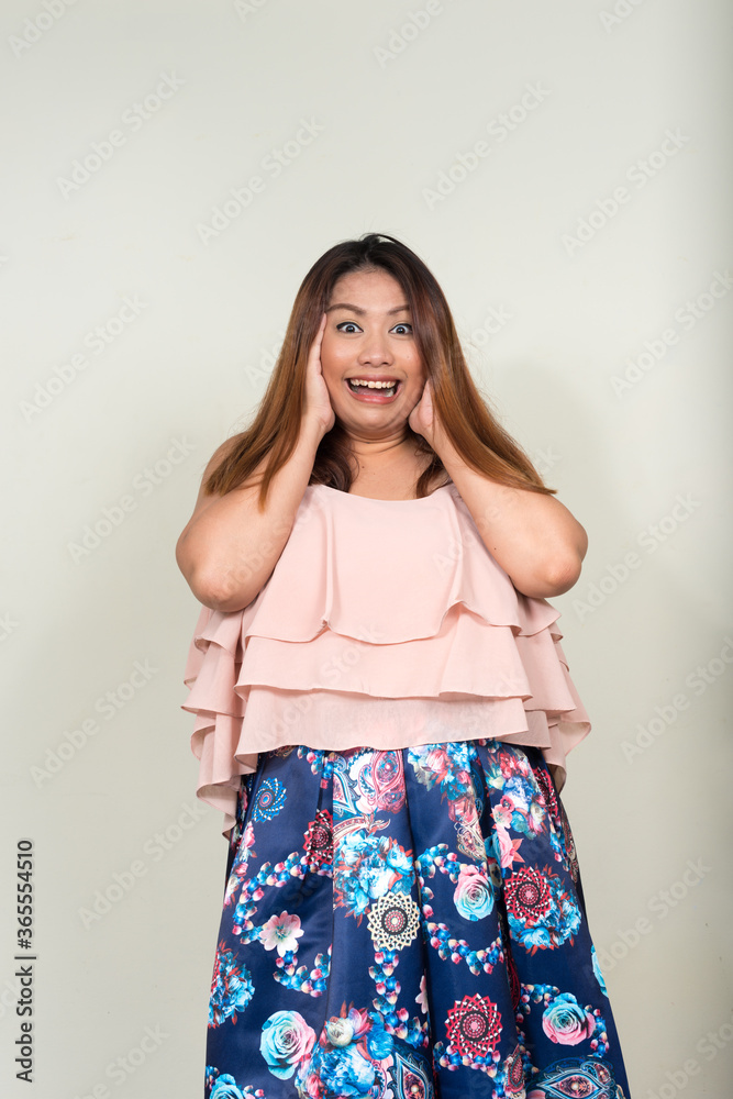 Portrait of young beautiful overweight Asian woman Portrait of young beautiful overweight Asian woman