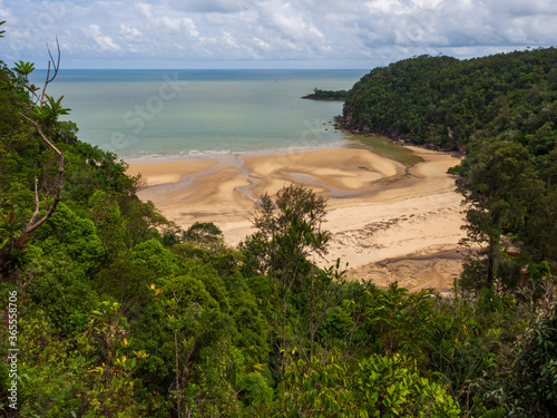 Beach surrounded by rainforest in Bako National Park, Sarawak, Malaysia