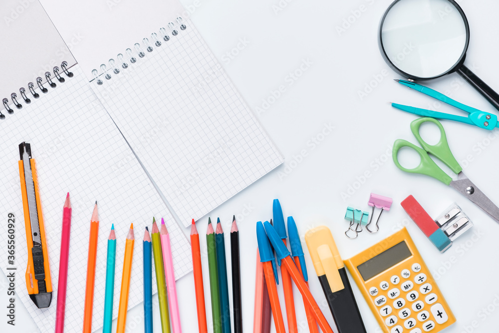 Many different school supplies on white copy space background. Back to school concept. Many different school supplies on white copy space background. Back to school concept.