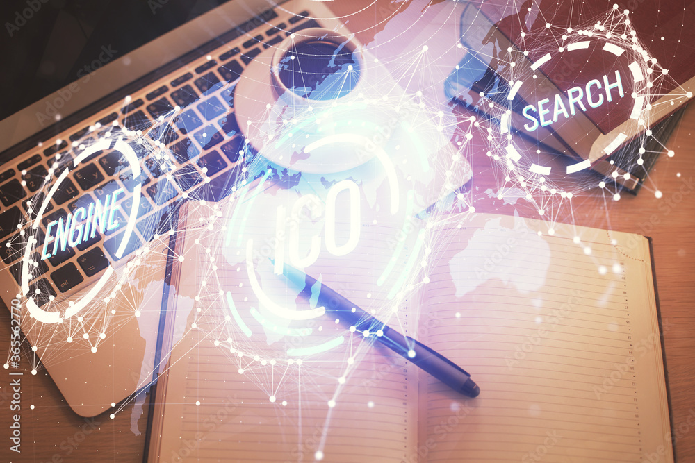 Blockchain theme hologram drawings over computer on the desktop background. Top view. Double exposure.