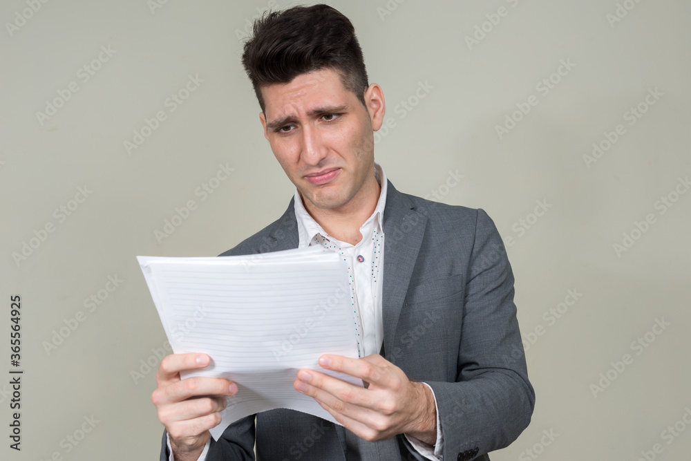Portrait of young multi ethnic businessman in suit Portrait of young multi ethnic businessman in suit