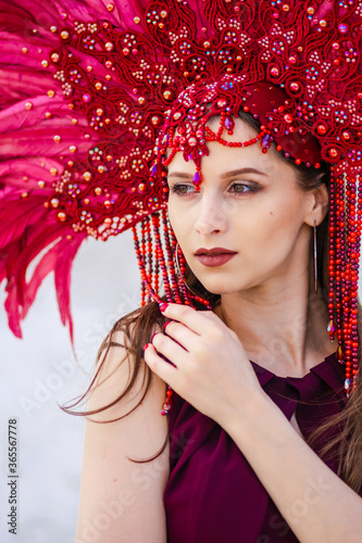A young beautiful girl in a Brazilian carnival costume. Portrait
