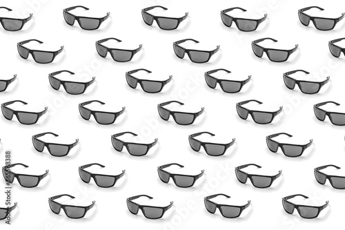 colorful pattern of sunglasses on a white background top view