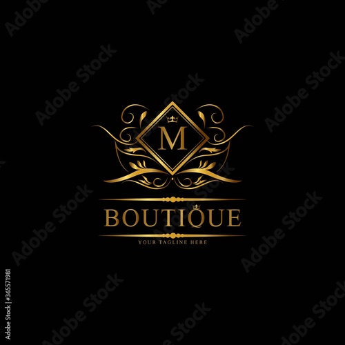 Vintage monograms M letter. Golden heraldic letter logos