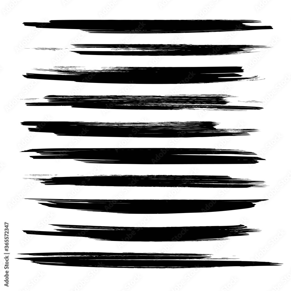 Long textured strokes of black paint isolated on white background