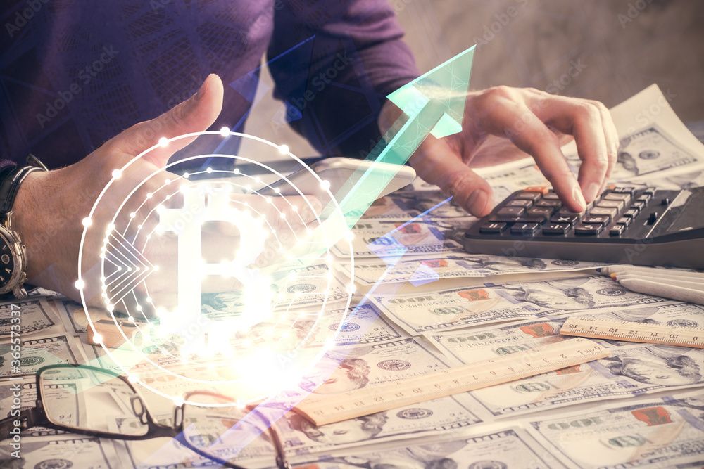 Double exposure of man's hands holding and using a phone and crypto currency blockchain theme drawing. Double exposure of man's hands holding and using a phone and crypto currency blockchain theme drawing.