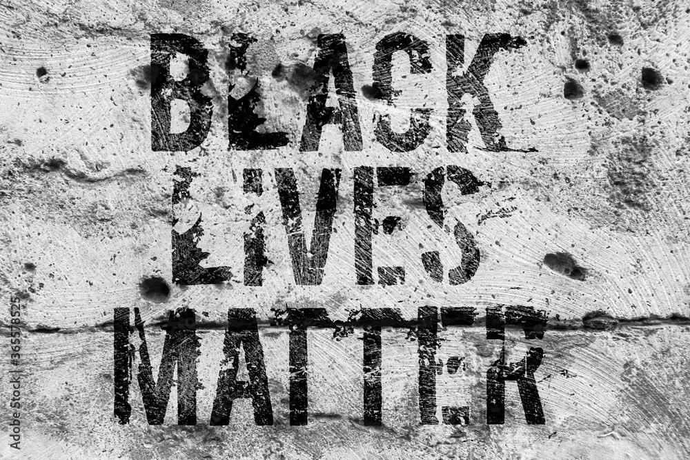 The inscription black lives matter on the toner wall. The inscription black lives matter on the toner wall.
