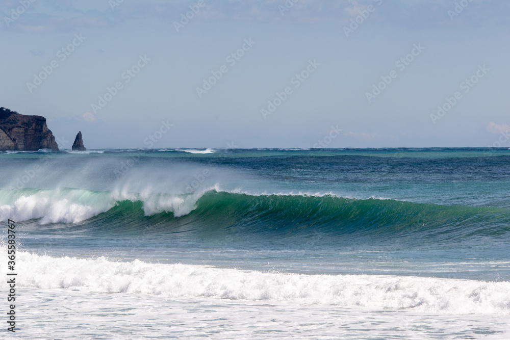Waves breaking in the Pacific Ocean close to Japan these are the type surfers like to ride. The beach is close to Tokyo City. Waves breaking in the Pacific Ocean close to Japan these are the type surfers like to ride. The beach is close to Tokyo City.