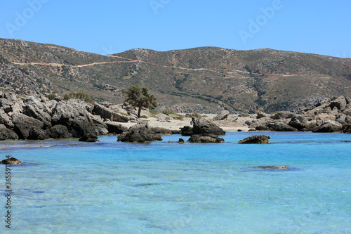 Kedrodasos beach private paradise blue lagoon free camping area rocky coast with crystal waters and corals covid-19 season prints photo