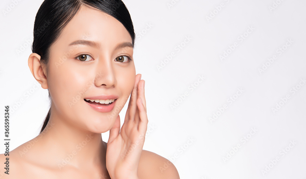 close up Portrait of Beautiful smiling young asian woman with clean skin, isolated on white background with skin healthcare concept. close up Portrait of Beautiful smiling young asian woman with clean skin, isolated on white background with skin healthcare concept.