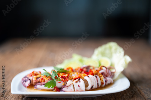 Steam Squid with Spicy Chili and Lemon Sauce - Pla Muk Nung Manow photo