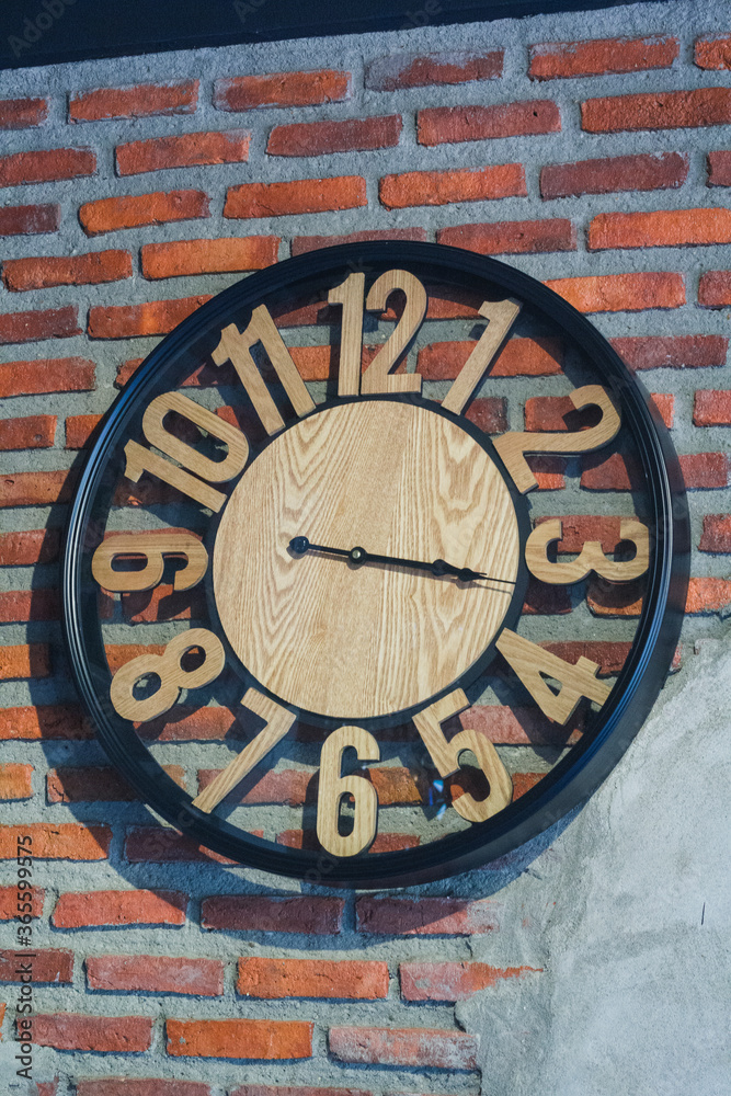 Vintage clock on the old wall