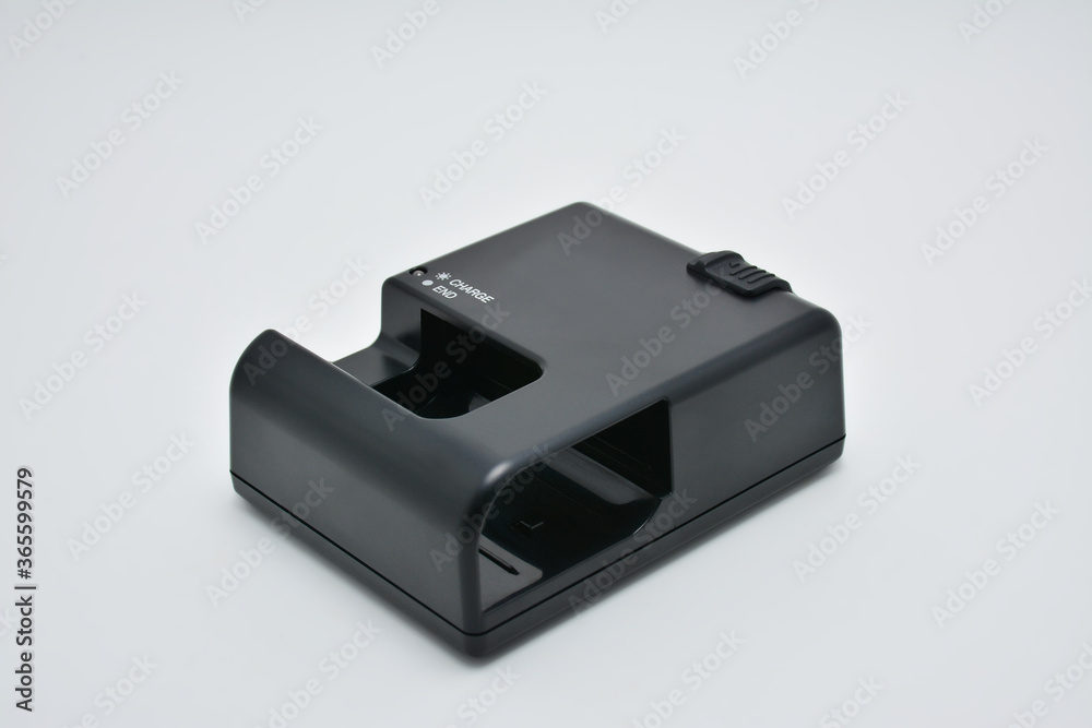 Black digital single lens reflex (DSLR) battery charger Black digital single lens reflex (DSLR) battery charger