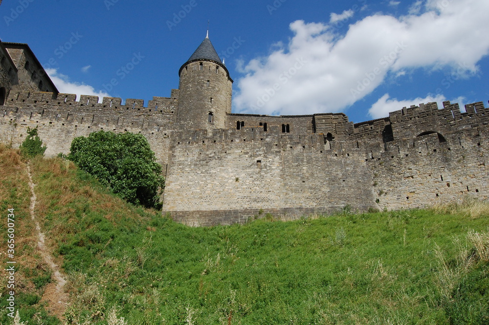 Carcassonne castle, Provence, France, side view of the castle from the side of the hill in a sunny day in Provence. Middle age castle UNESCO.