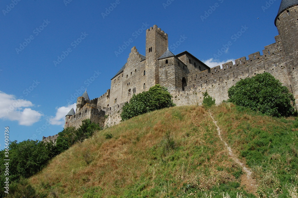 Carcassonne castle, Provence, France, side view of the castle from the side of the hill in a sunny day in Provence. Middle age castle UNESCO.