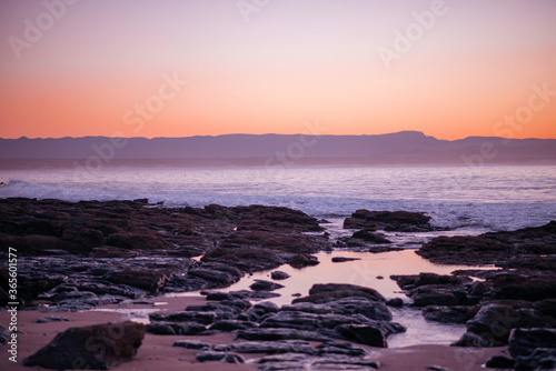 Landscape view of coastline during sunrise