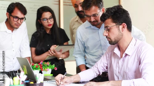 Indian team working together in office