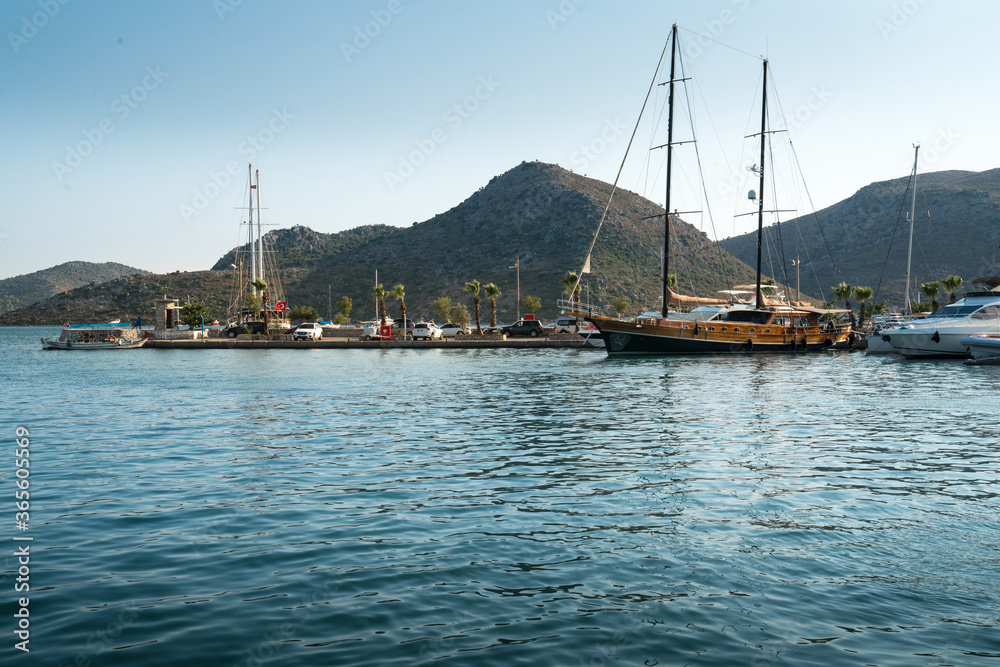 Bozburun village on Bozburun peninsula near Marmaris resort town in Mugla province on the south west coast of Turkey, Many sailboats and yacht boats in the sea.
