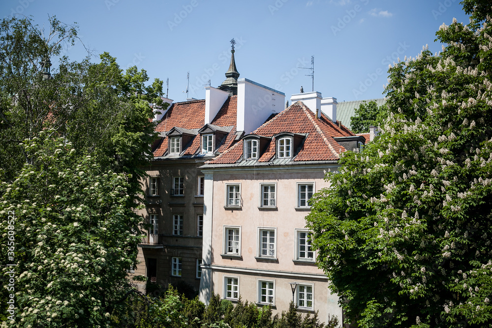 Houses among trees in the old town in Warsaw