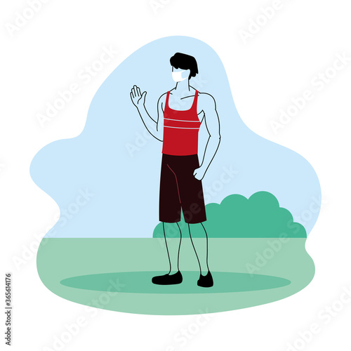 young man with mask in the park