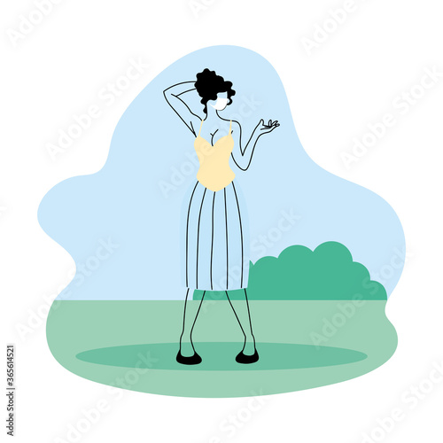 young woman with mask in the park