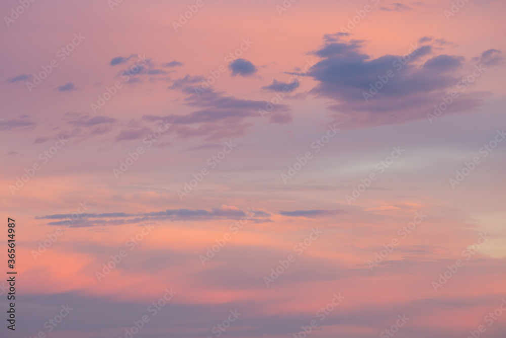 Natural background. Evening sky with sunset clouds.