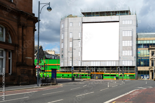 Mock up image: square blank billboard on a building. British town, Edinburgh. photo