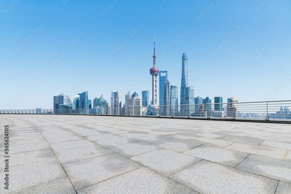 shanghai skyline and empty granite stones ground