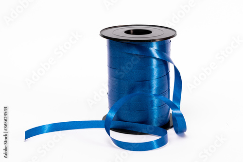 coil of blue ribbon for decoration isolated on white background