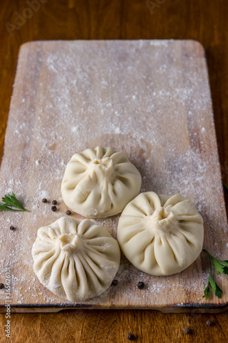 Homemade dumplings with pepper and herbs