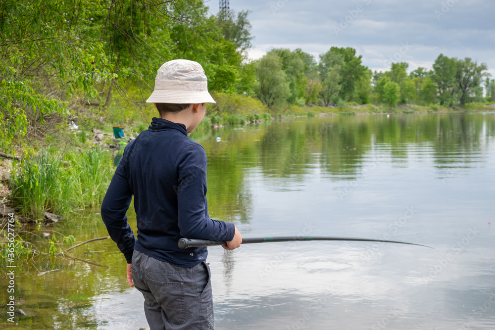 Boy catching fish Boy catching fish