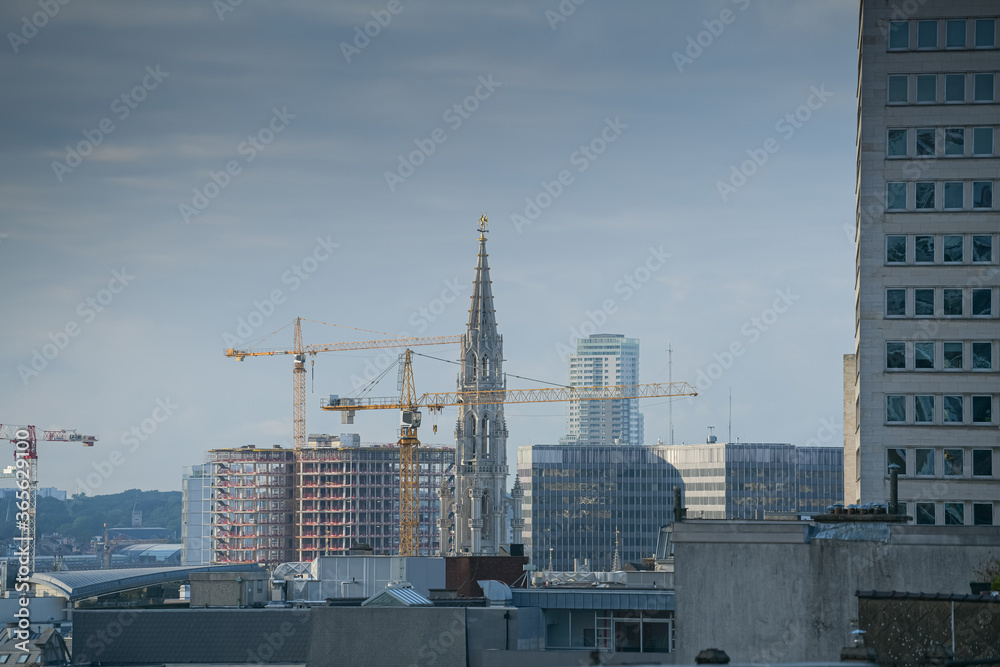 Construction site in Brussels Belgium with the church from Grand Place in background