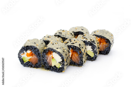 Japanese Black rice Roll with salmon, avocado, Philadelphia cream cheese, flying fish roe (Tobiko caviar) wrapped in mamenori seaweed isolated on white background. Menu isolation.  © Art Food