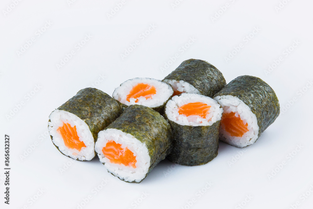 Side view of Japanese Sake Maki Roll with salmon and rice wrapped in nori seaweed. Close-up of asian traditional dish isolated on gray background. Isolation menu image
Side view of Japanese Sake Maki Roll with salmon and rice wrapped in nori seaweed. Close-up of asian traditional dish isolated on gray background. Isolation menu image