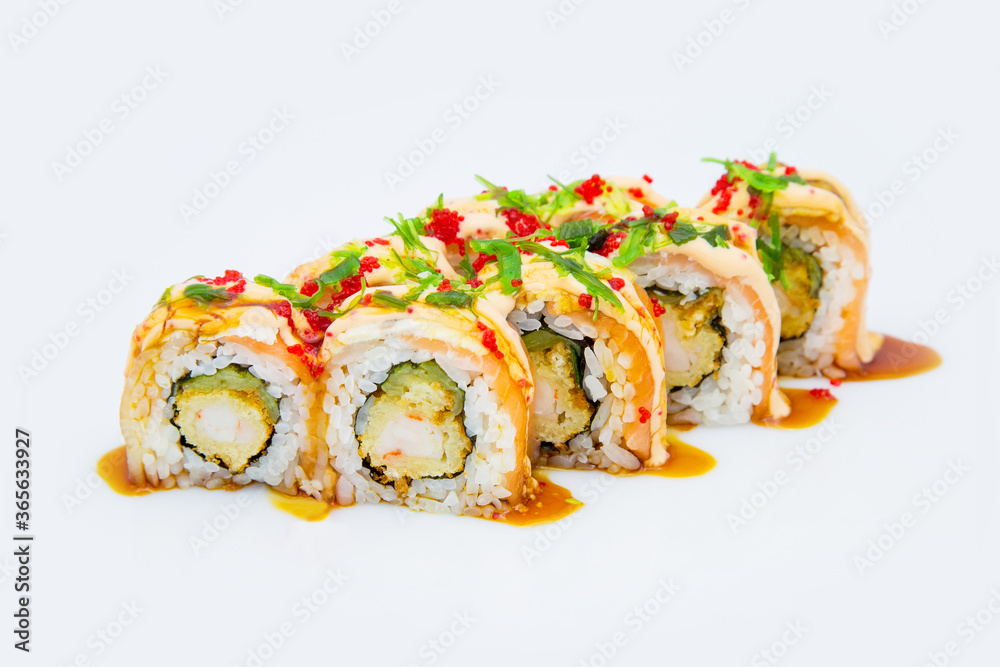 Japanese Sushi Roll with tempura shrimp, cumber, rockfish isolated on white. Menu isolation. served with sauce Hiyasi wakame chuka and flying fish roe (Tobiko caviar). Roll with salmon and eel on top
Japanese Sushi Roll with tempura shrimp, cumber, rockfish isolated on white. Menu isolation. served with sauce Hiyasi wakame chuka and flying fish roe (Tobiko caviar). Roll with salmon and eel on top
