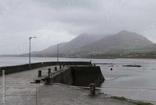 Картината върху платно A view of Croagh Patrick under cloud, on a gloomy day, from the pier at Old Head on Clew Bay, County Mayo, Ireland