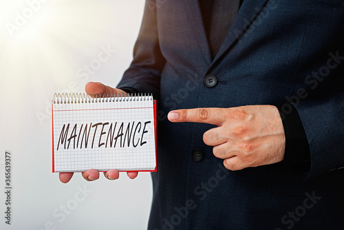 Handwriting text Maintenance. Conceptual photo method of preserving or maintaining someone or something Model displaying different empty color notepad mock-up for writing idea photo