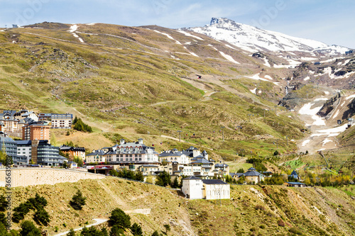 PRADOLLANO, SPAIN - MAY 4, 2017: Town of Pradollano in Sierra Nevada mountains in Spain is a popular tourist destination and winter ski resort.