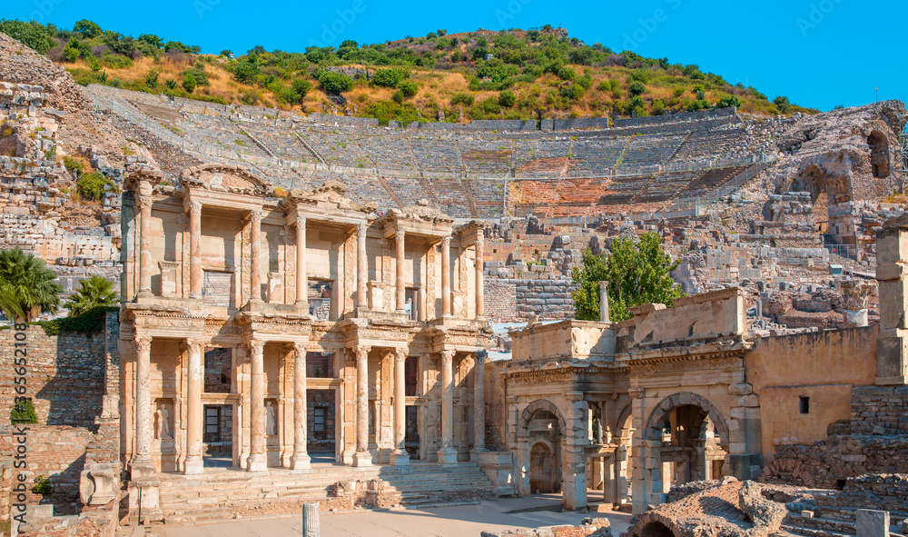 Celsus Library in Ephesus on the background Amphitheater in Ephesus (Efes) - Selcuk, Turkey