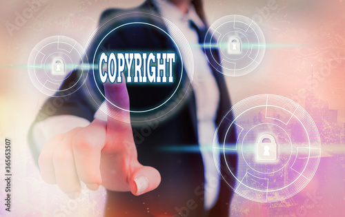 Text sign showing Copyright. Business photo showcasing exclusive legal right to print write perform film record literary Graphics padlock for web data information security application system