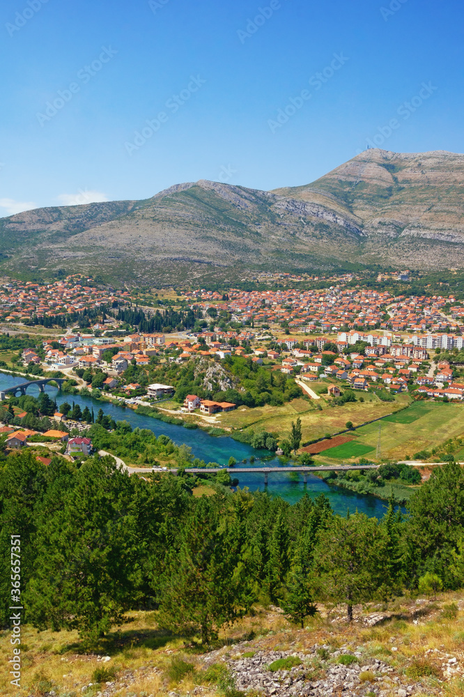 Beautiful sunny summer landscape. View of Trebinje city from Crkvina Hill. Bosnia and Herzegovina, Republika Srpska