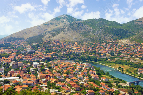 View of ancient city of Trebinje and Trebisnjica river on sunny summer day. Bosnia and Herzegovina, Republika Srpska