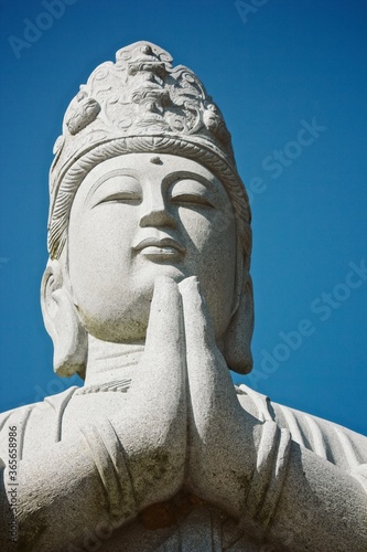 Closeup shot of the Buddha statue in the Bacalhoa Buddha Eden garden in Portugal photo