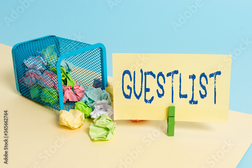 Handwriting text writing Guestlist. Conceptual photo list of the individuals invited to a specific or particular event Trash bin crumpled paper clothespin empty reminder office supplies tipped photo