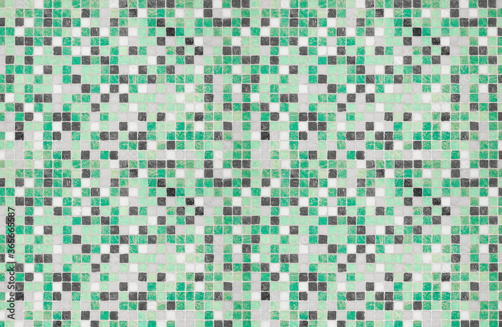 Mosaic wall texture in green and emerald colors