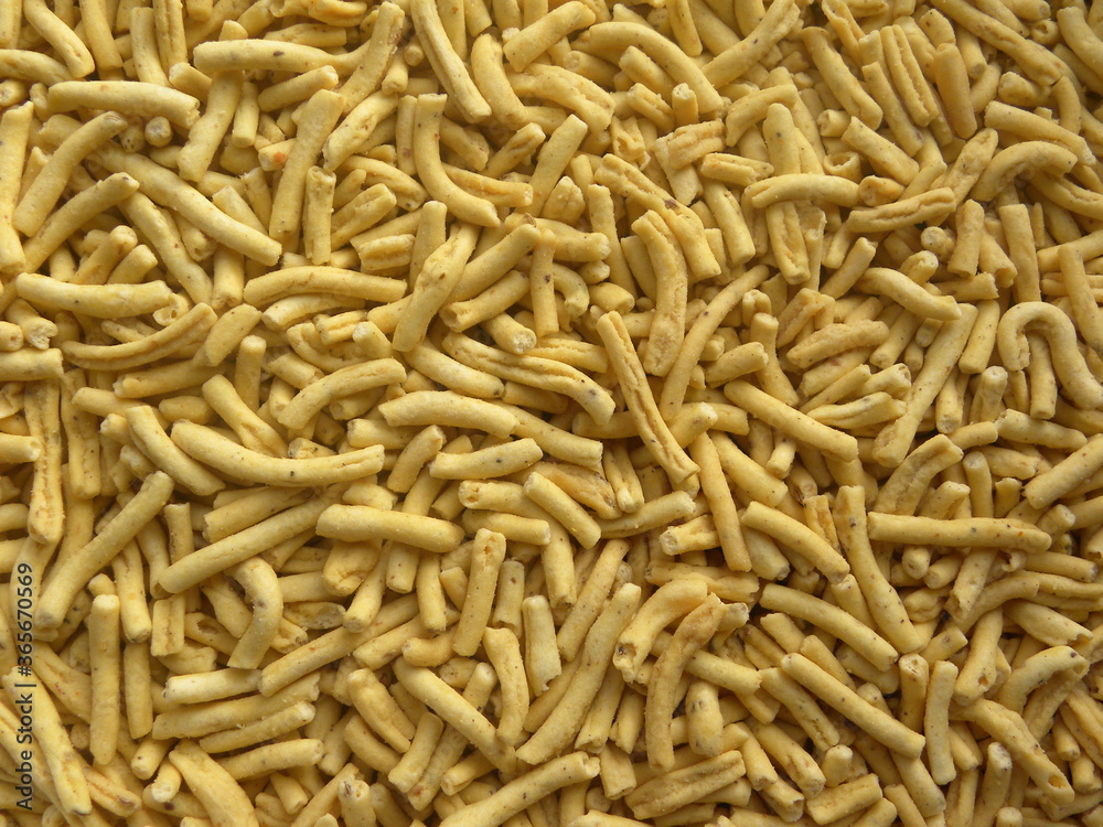 Yellow color fried Ratlami sev spicy Indian snack made from chickpea flour Yellow color fried Ratlami sev spicy Indian snack made from chickpea flour